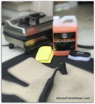 auto steam cleaner cleaning car floor mat