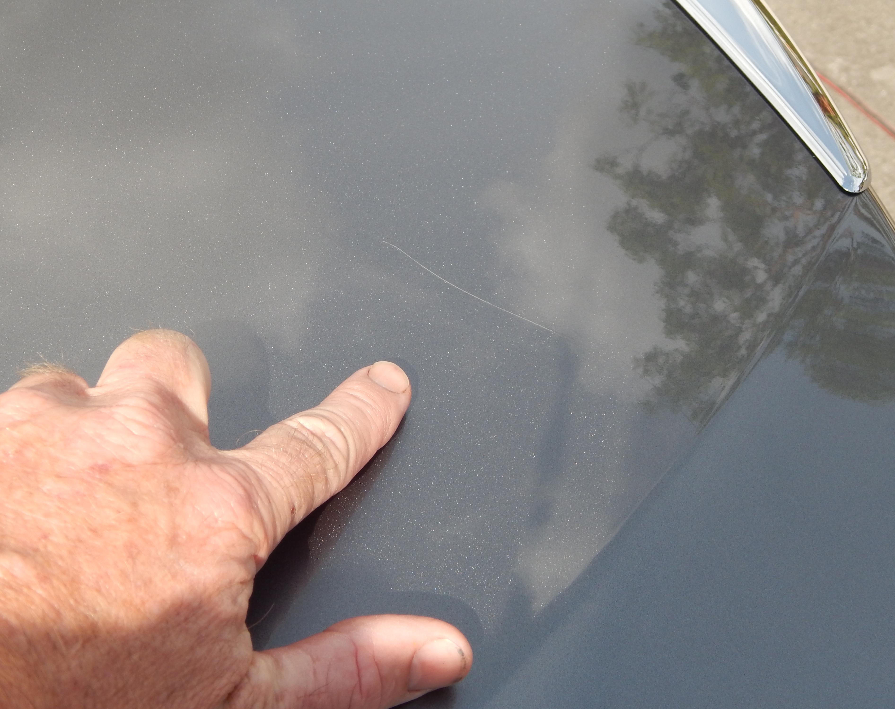 car paint scratch on car hood