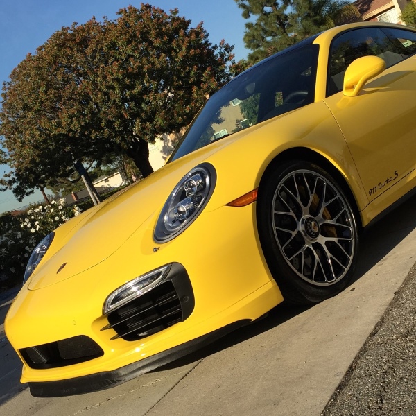 Porsche turbo s in bright yellow porsche turbo s yellow