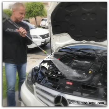 pressure washer to clean and detail car engine