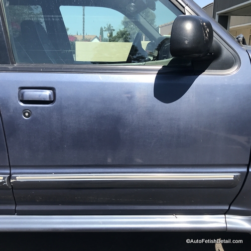 severe clear coat oxidation on blue Ford Explorer severe clear coat oxidation