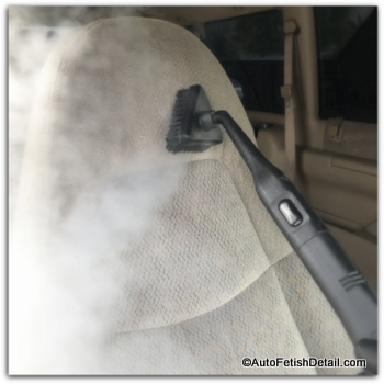 Using a VX5000 upholstery steam cleaner to clean and shampoo the passenger cloth seat of a Chevy Astro van. cleaning car upholstery with upholstery steam cleaner