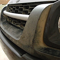 black car trim after being restored using solution finish faded black car trim before solution finish